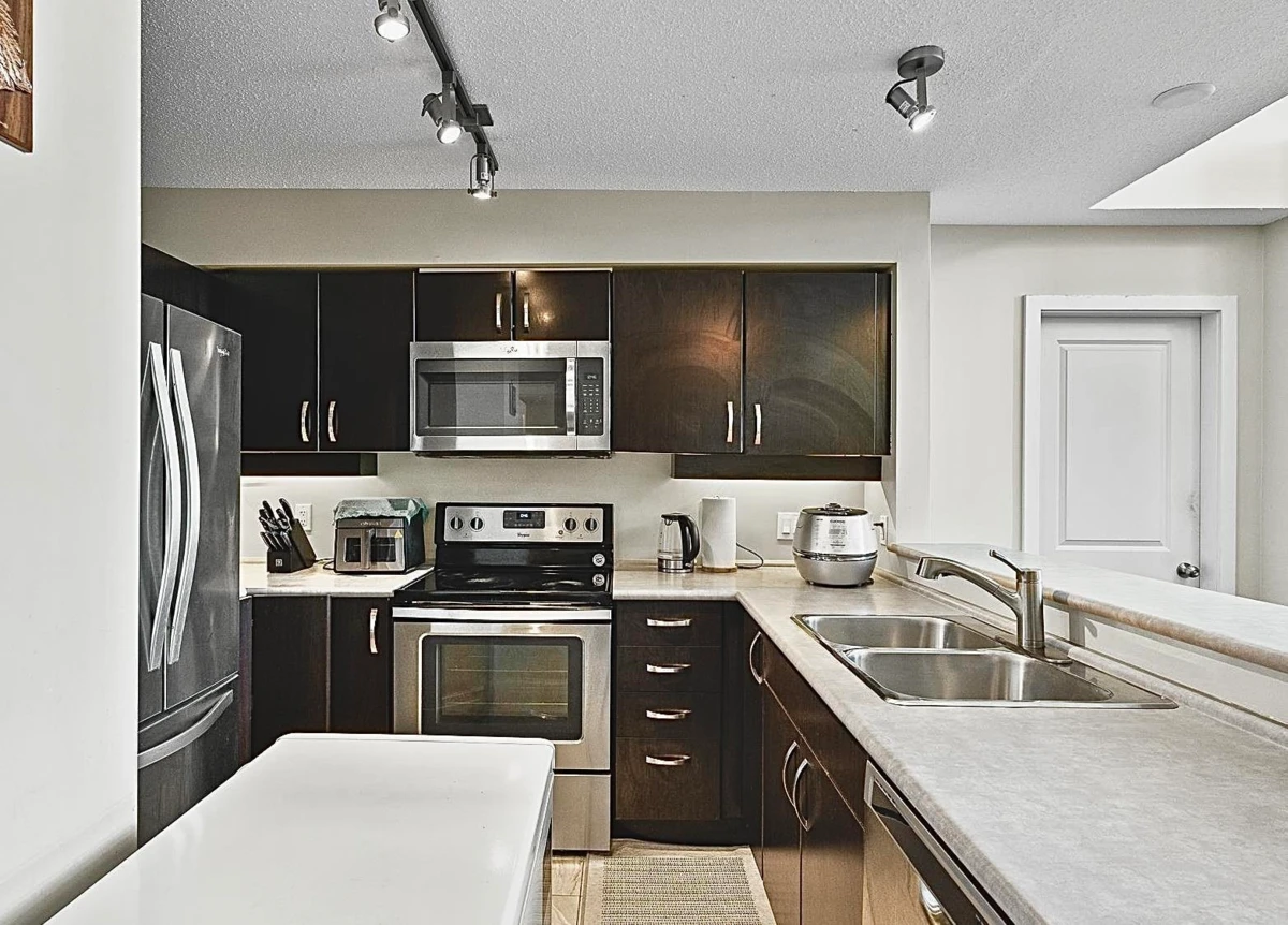 Living Room Photo of 452 10838 City Parkway, Surrey, BC
