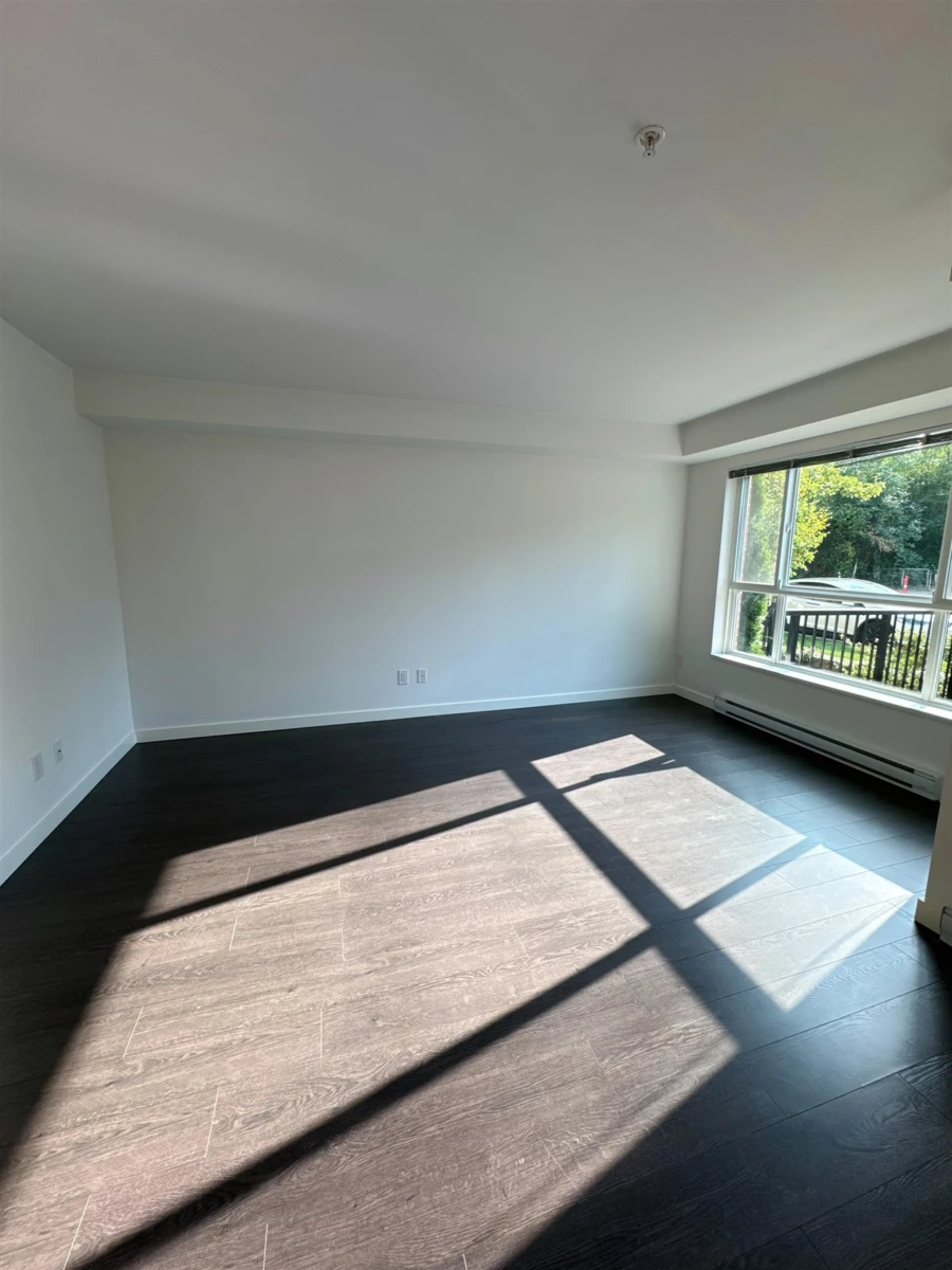 Living Room Photo of 103 10688 140 Street, Surrey, BC