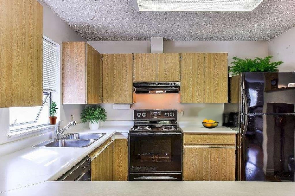 Exterior Rear Photo of 202 7131 133a Street, Surrey, BC