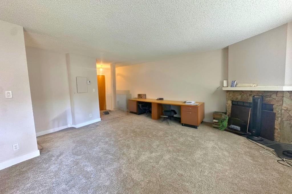 Family Room Photo of 202 7131 133a Street, Surrey, BC