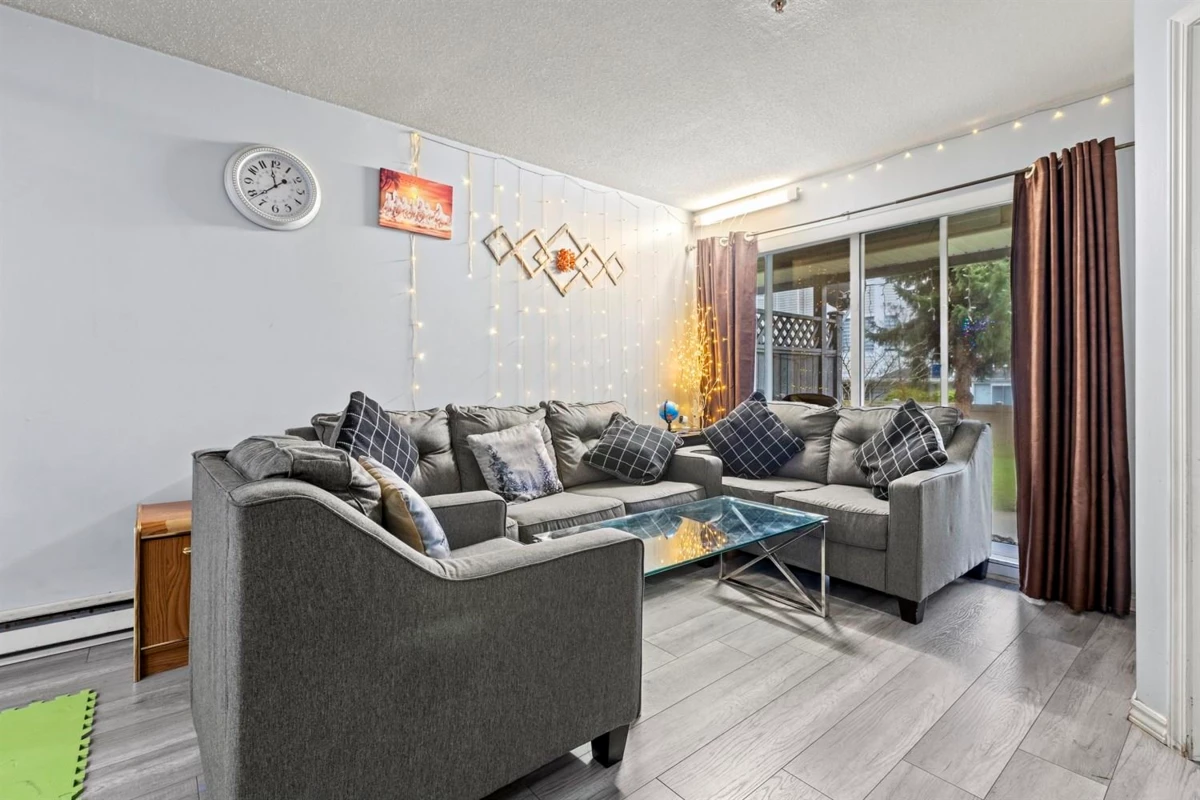Living Room Photo of 103 12160 80 Avenue, Surrey, BC