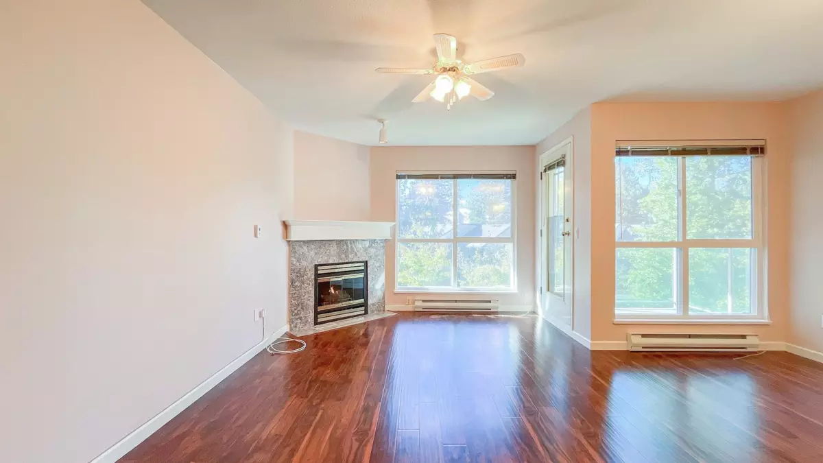 Living Room Photo of 302 14980 101a Avenue, Surrey, BC