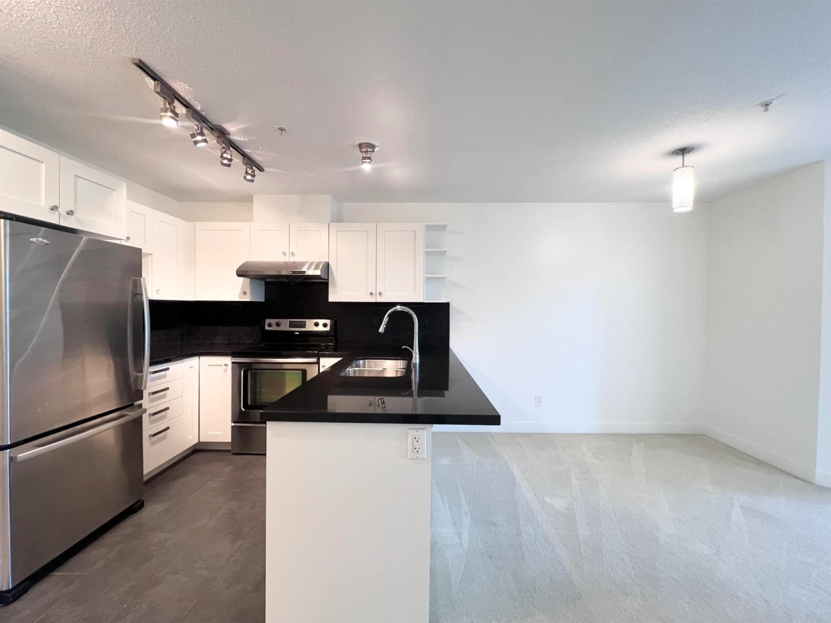 Family Room Photo of 305 4550 Fraser Street, Vancouver, BC