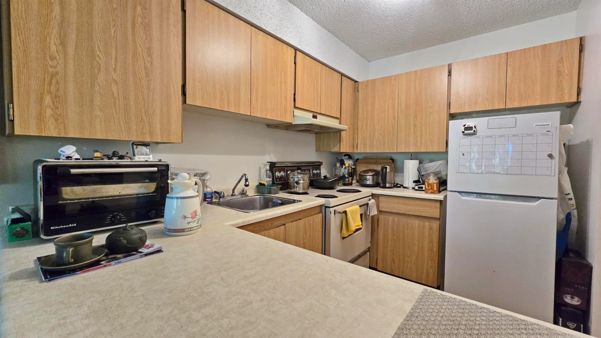 Family Room Photo of 210 7144 133b Street, Surrey, BC