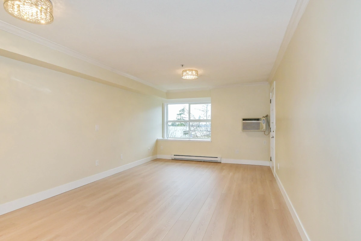 Living Room Photo of 310 17769 57 Avenue, Surrey, BC