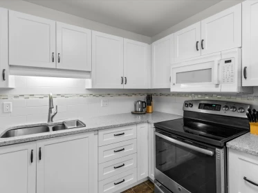 Guest Bathroom Photo of 210 27358 32 Avenue, Langley, BC