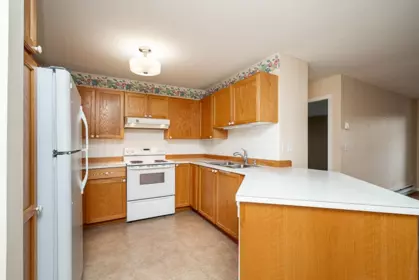 Living Room Photo of 102 17695 58 Avenue, Surrey, BC