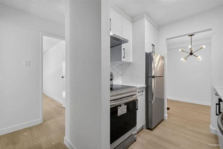 Family Room Photo of 121 8511 Ackroyd Road, Richmond, BC