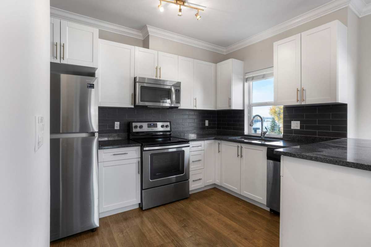 Living Room Photo of 301 11580 223 Street, Maple Ridge, BC