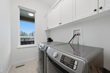 Laundry Room Photo of 31577 Mccreath Place, Mission, BC