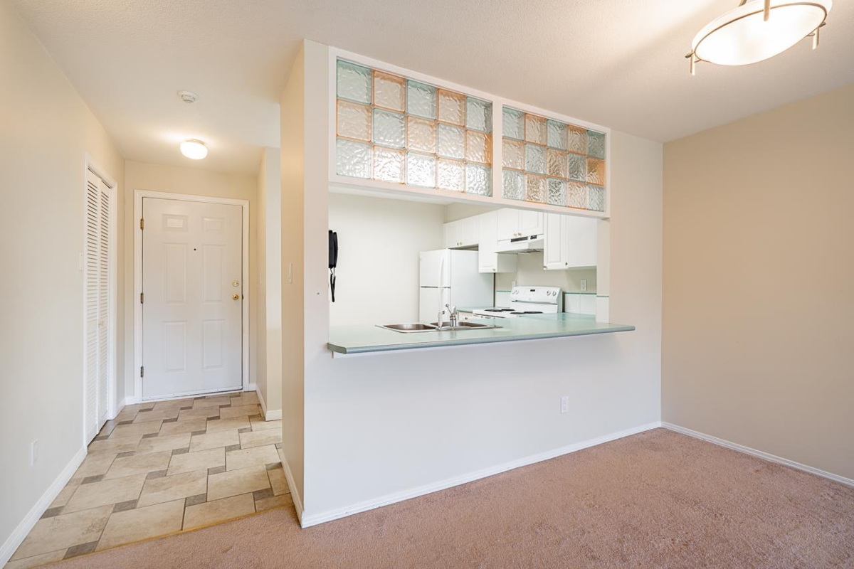 Family Room Photo of 314 15110 108 Avenue, Surrey, BC