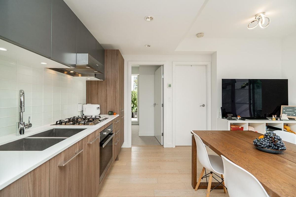 Living Room Photo of 301 4638 Gladstone Street, Vancouver, BC