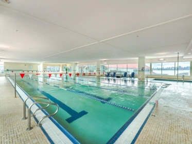 Basement Recreation Room Photo of 303 185 Victory Ship Way, North Vancouver, BC