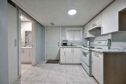 Laundry Room Photo of 14346 68b Avenue, Surrey, BC