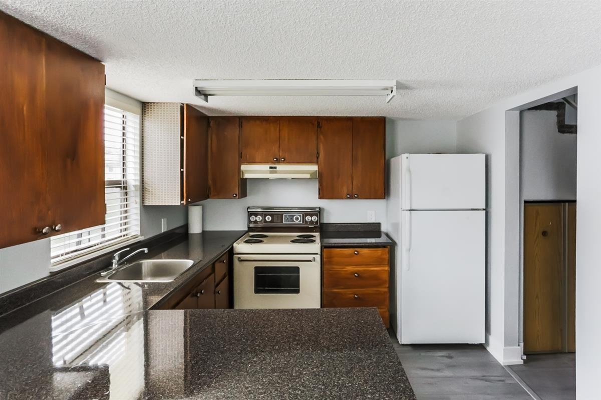 Exterior Rear Photo of 204 13316 71b Avenue, Surrey, BC