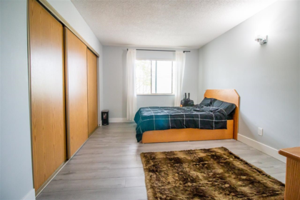 Walk-In Closet Photo of 204 13316 71b Avenue, Surrey, BC