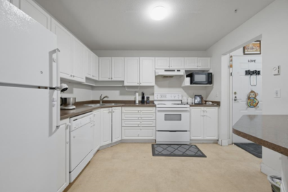 Laundry Room Photo of 107 2435 Center Street, Abbotsford, BC