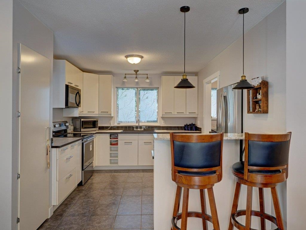 Powder Room Photo of 6557 Bjorn Place, Sechelt, BC