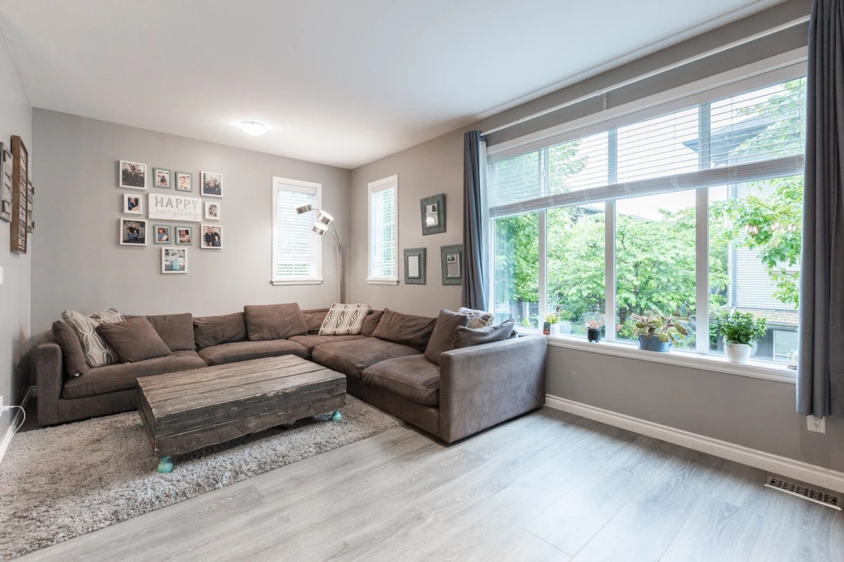 Living Room Photo of 129 18777 68a Avenue, Surrey, BC
