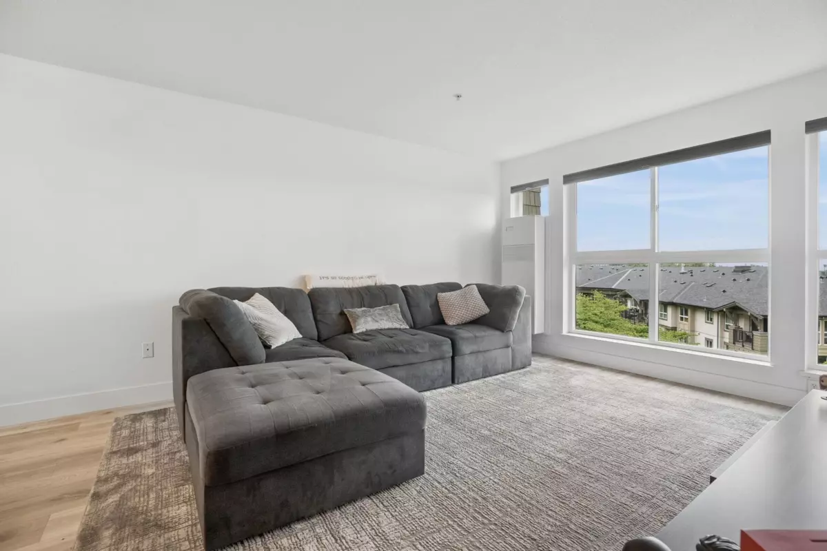 Living Room Photo of 202 3082 Dayanee Springs Boulevard, Coquitlam, BC