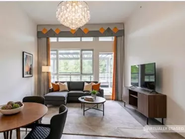 Living Room Photo of 405 15628 104 Avenue, Surrey, BC