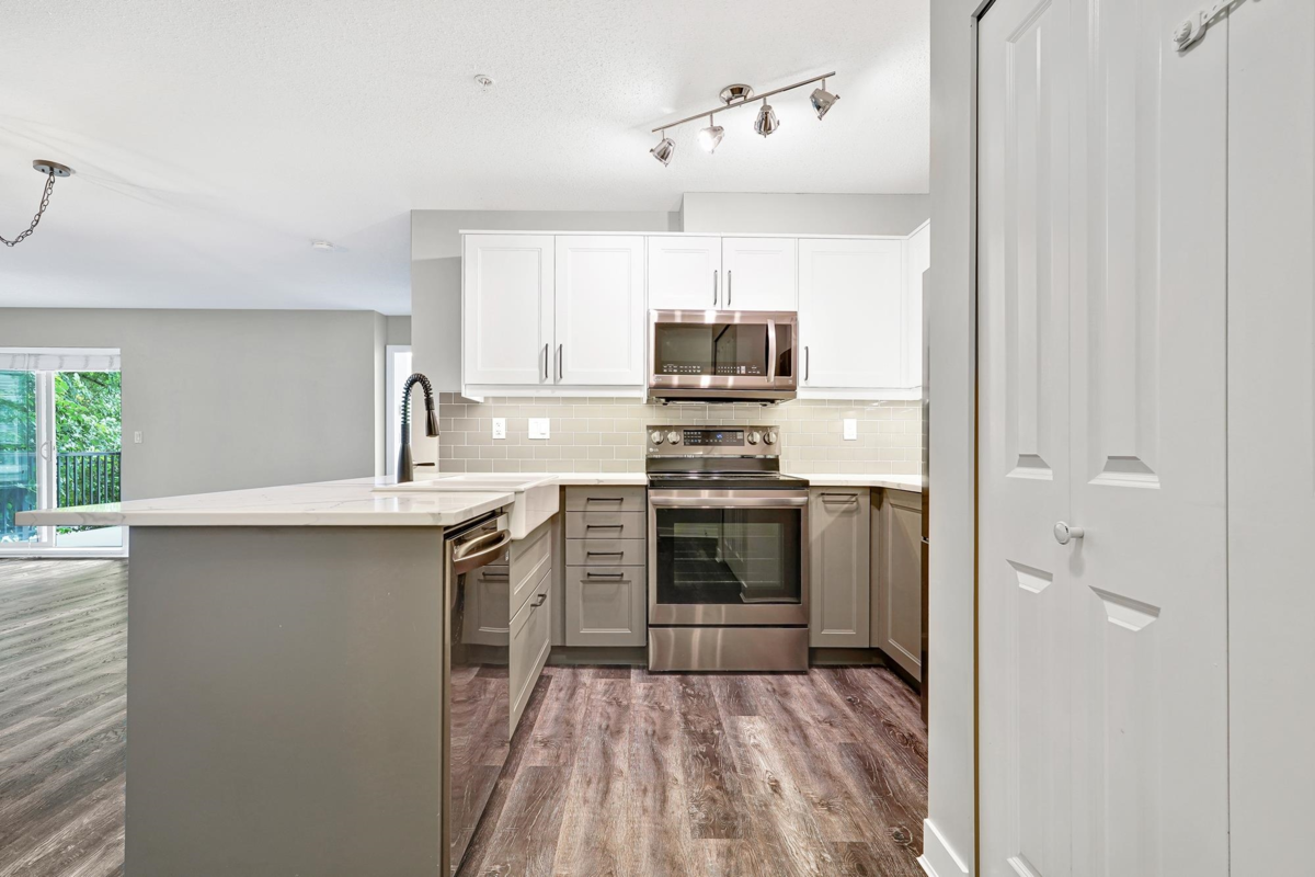 Living Room Photo of D210 8929 202 Street, Langley, BC