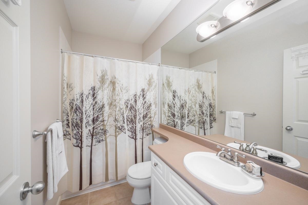 Basement Recreation Room Photo of 1 6105 River Road, Delta, BC