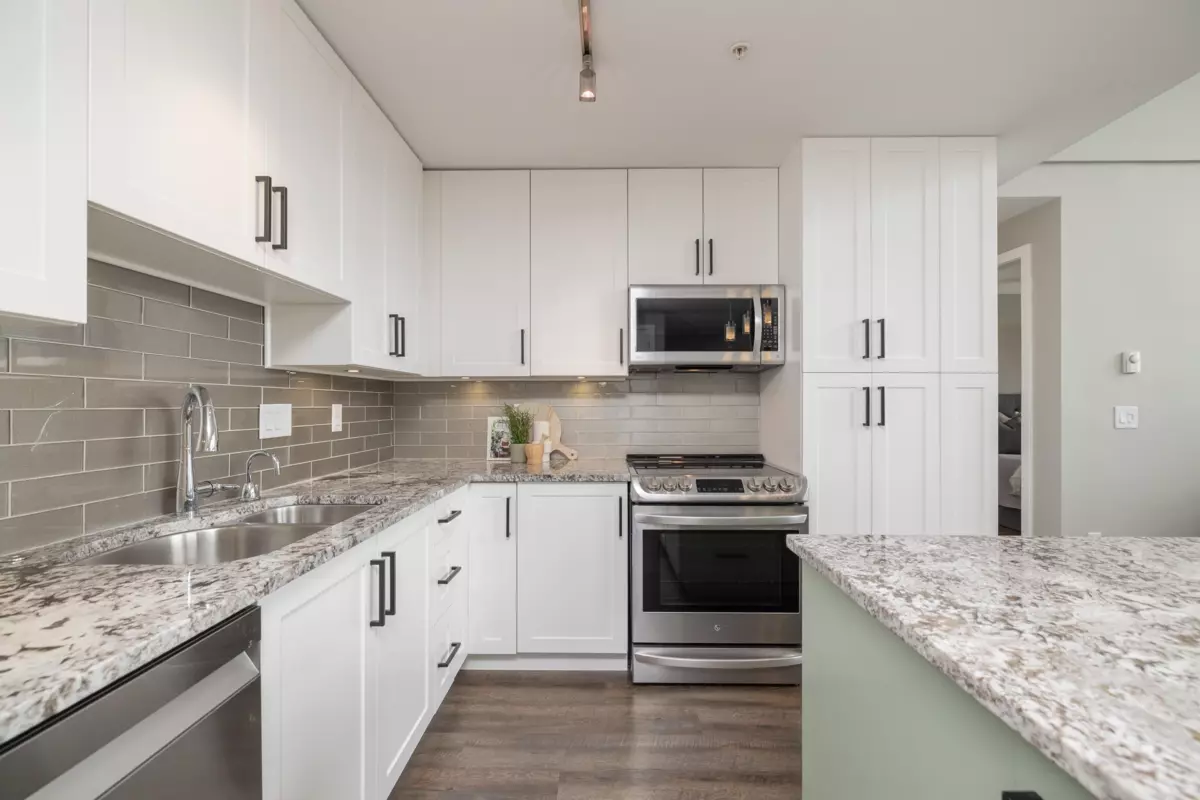 Living Room Photo of 415 6490 194 Street, Surrey, BC