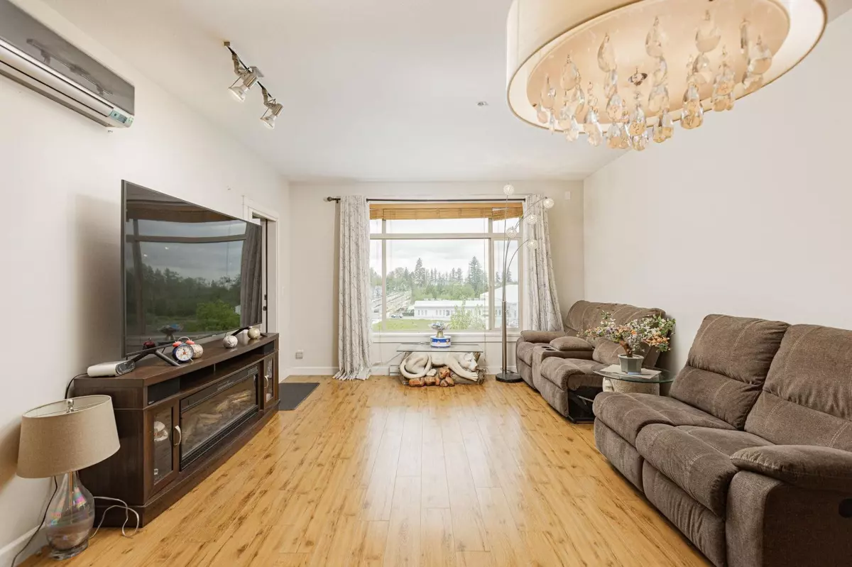Living Room Photo of 405 8067 207 Street, Langley, BC