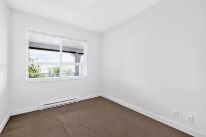 Laundry Room Photo of 309 16380 64 Avenue, Surrey, BC