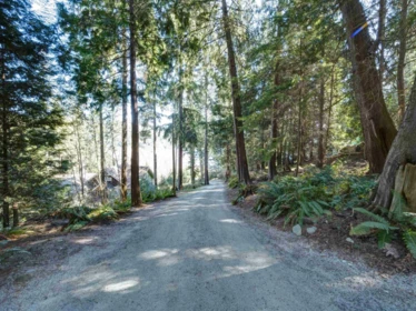Aerial View of 7653 Redrooffs Road, Halfmoon Bay, BC
