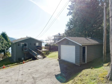 Front Yard Photo of 7653 Redrooffs Road, Halfmoon Bay, BC