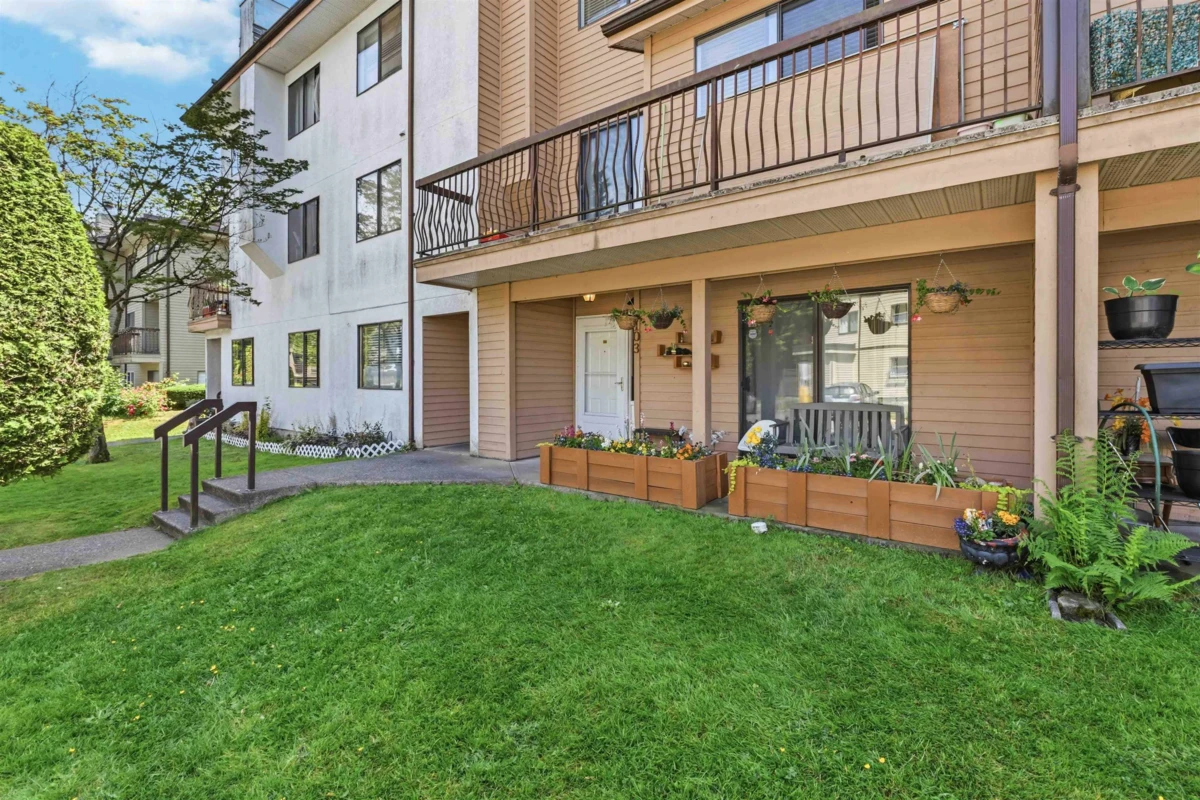 Living Room Photo of 103 7139 133a Street, Surrey, BC