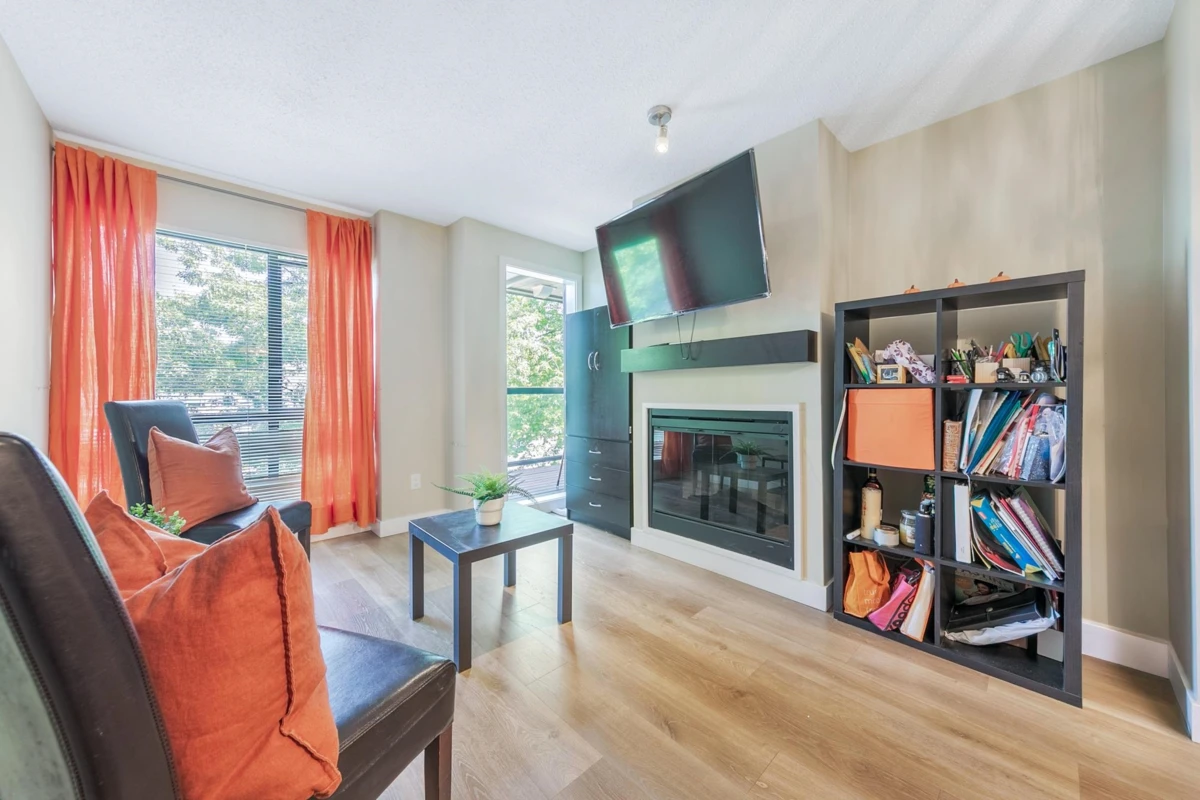 Family Room Photo of 334 10838 City Parkway, Surrey, BC