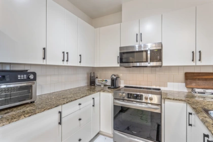 Primary Bedroom Photo of 102 15385 101a Avenue, Surrey, BC