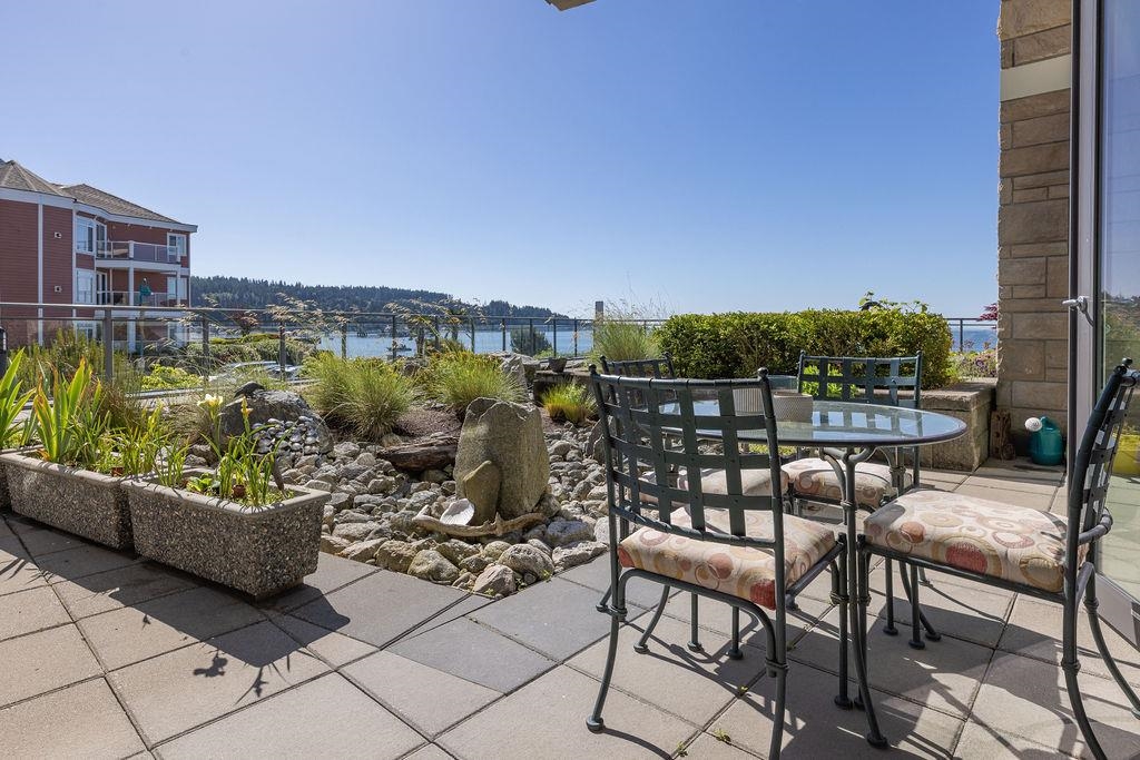 Living Room Photo of 203 5665 Teredo Street, Sechelt, BC