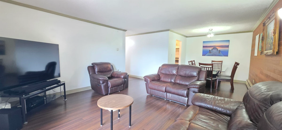 Living Room Photo of 202 7473 140 Street, Surrey, BC