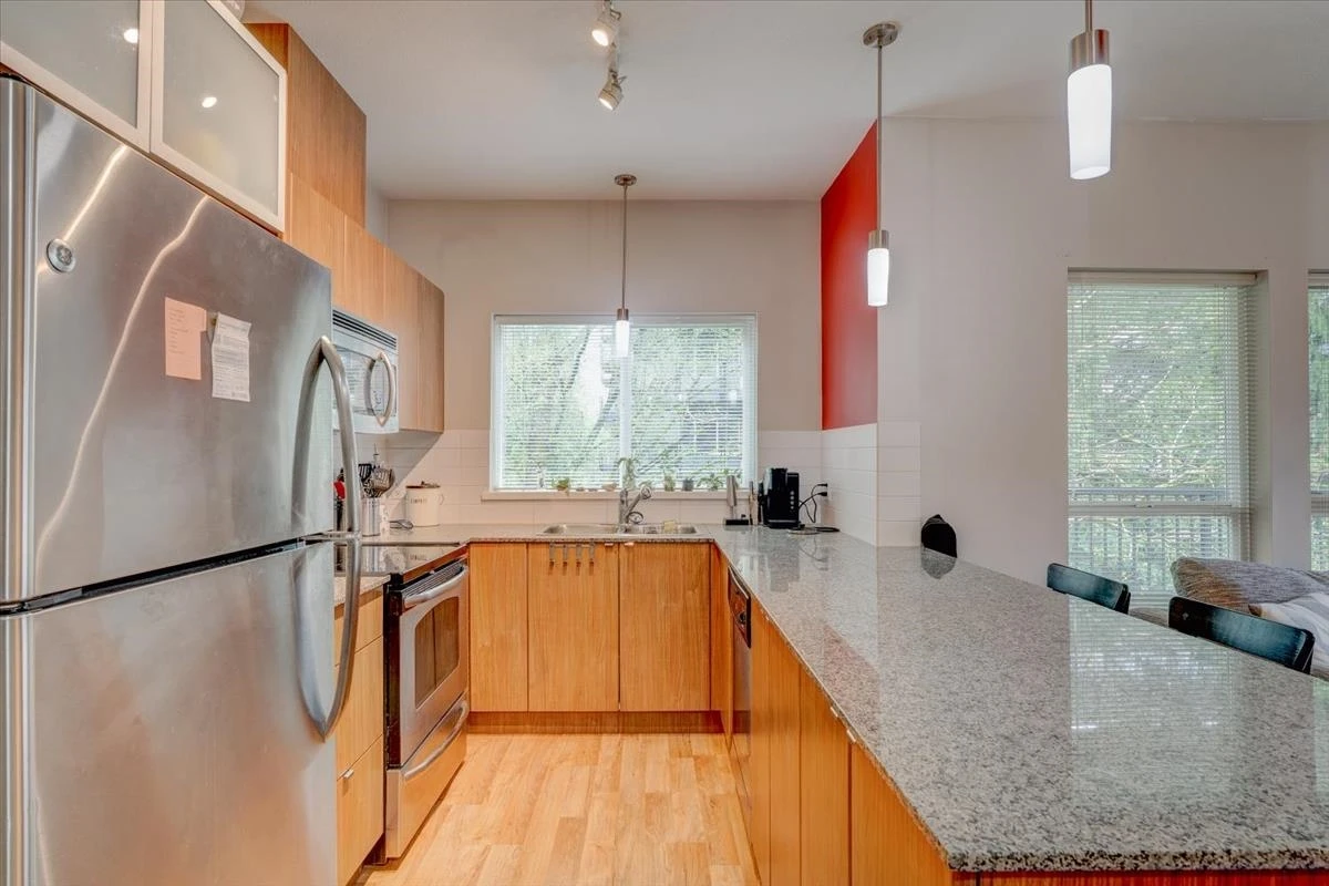 Dining Area Photo of 215 9655 King George Boulevard, Surrey, BC