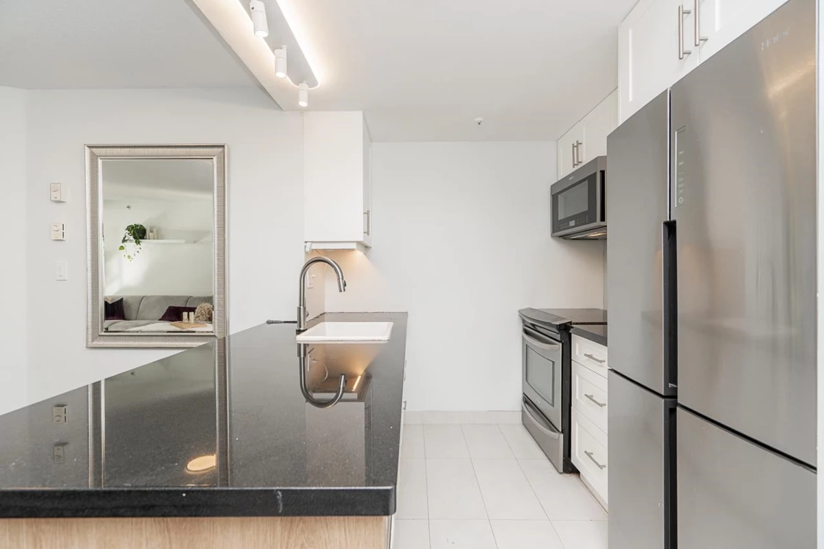 Family Room Photo of 403 811 Helmcken Street, Vancouver, BC