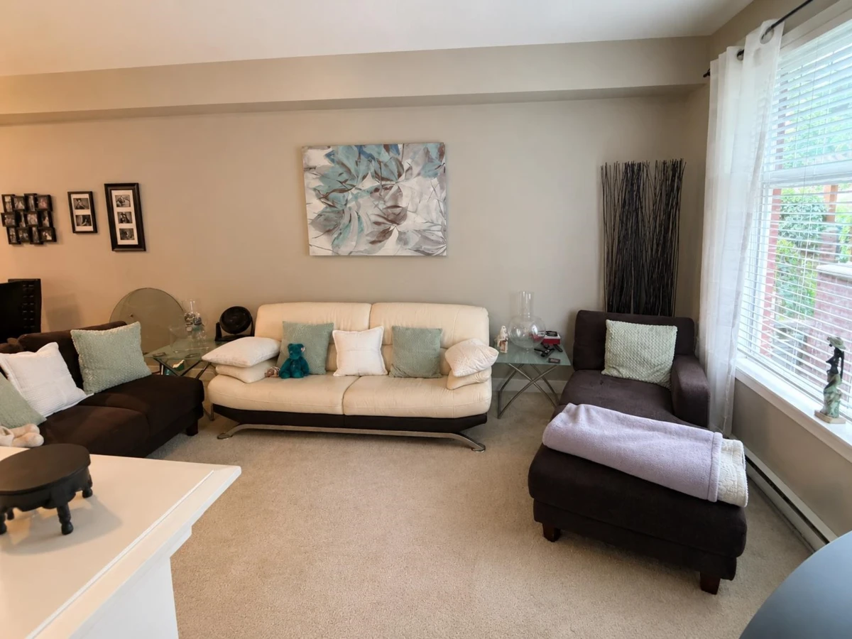 Living Room Photo of 102 17712 57a Avenue, Surrey, BC