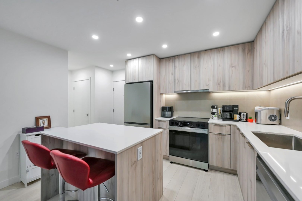 Family Room Photo of 409 3596 Malsum Drive, North Vancouver, BC