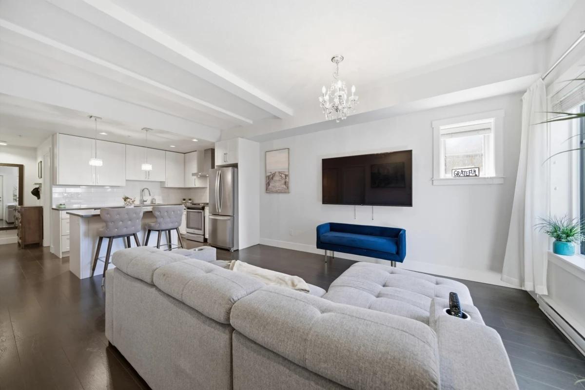 Living Room Photo of 104 16528 24a Avenue, Surrey, BC