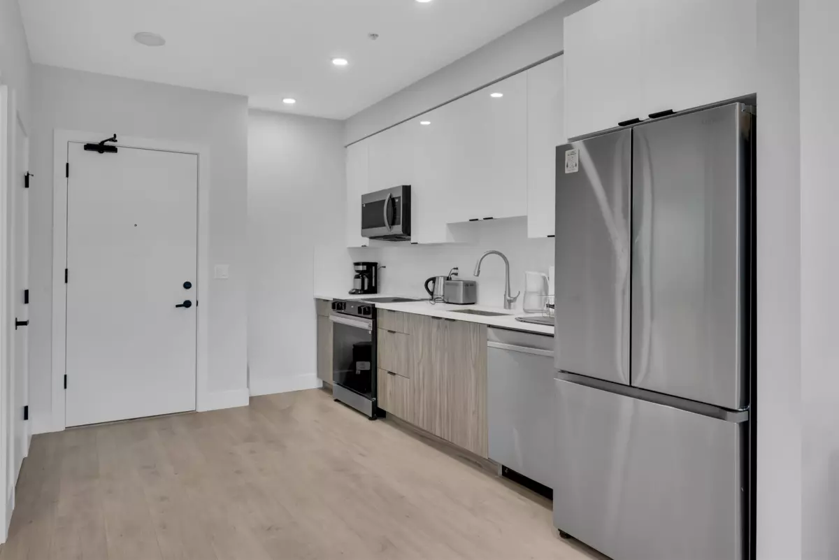 Living Room Photo of 206 13458 95 Avenue, Surrey, BC