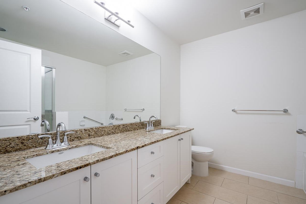 Laundry Room Photo of 202 15388 101 Avenue, Surrey, BC