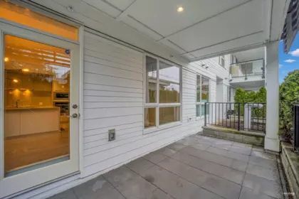 Laundry Room Photo of 109 6677 Cambie Street, Vancouver, BC