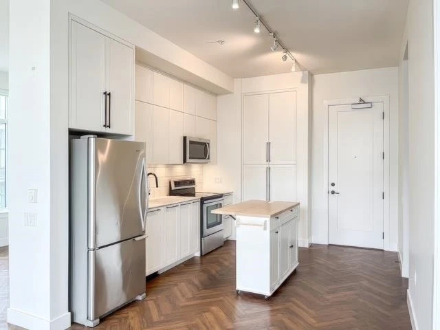 Family Room Photo of 314 14968 101a Avenue, Surrey, BC