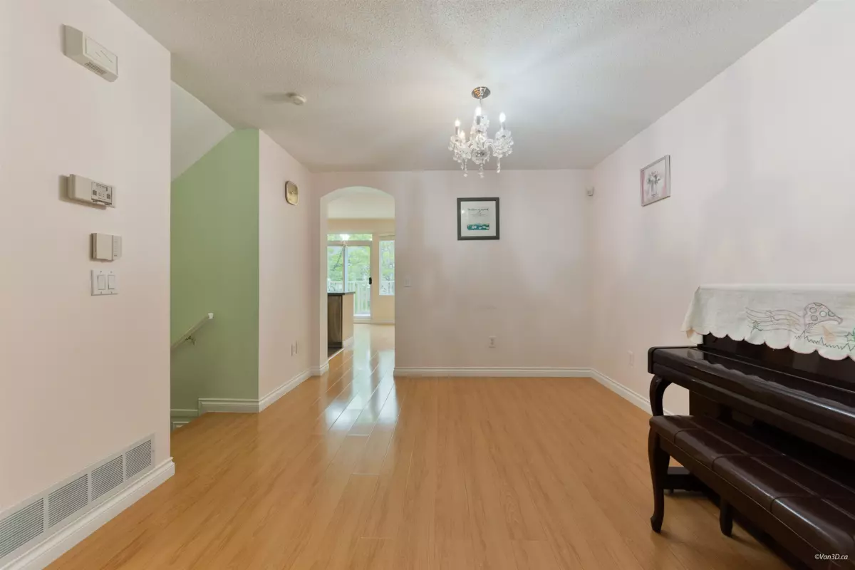Living Room Photo of 8 7500 Cumberland Street, Burnaby, BC