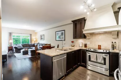 Living Room Photo of 401 6480 195a Street, Surrey, BC