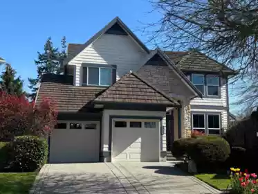 Front exterior of 15448 33a Avenue, Surrey, BC
