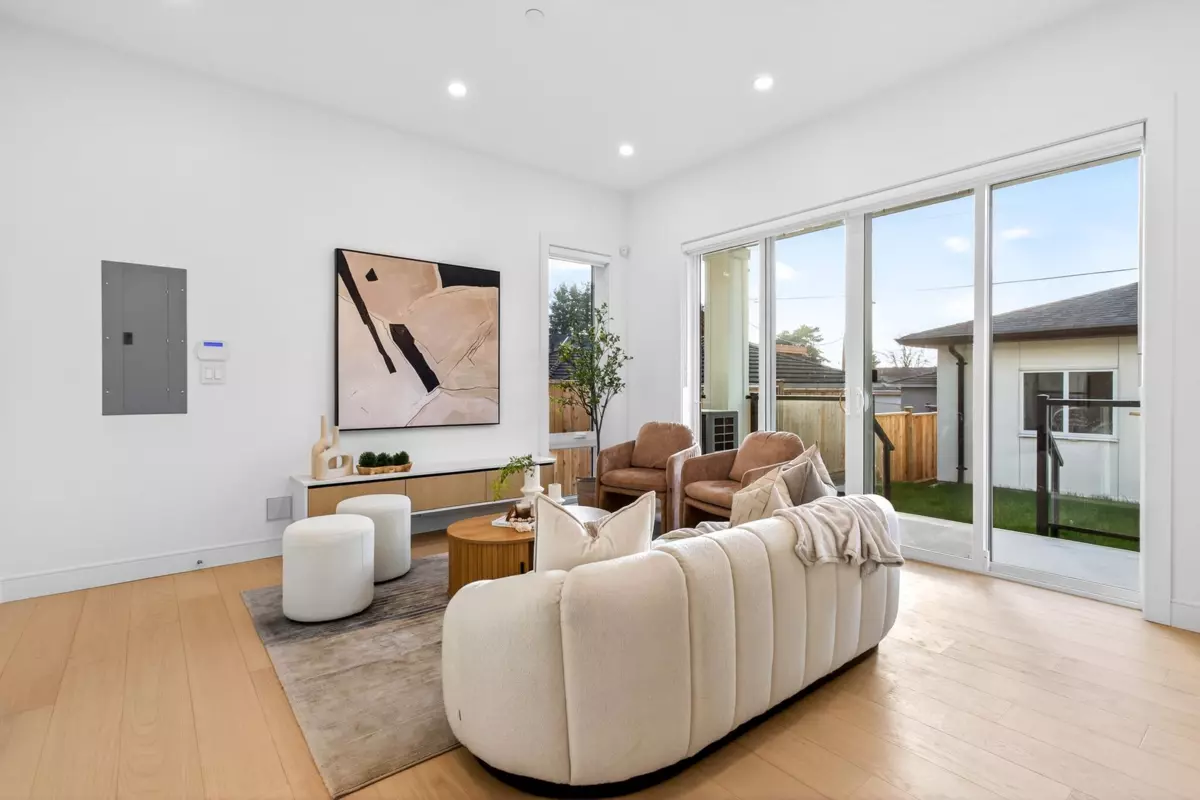 Family Room Photo of 2 6933 Prince Edward Street, Vancouver, BC